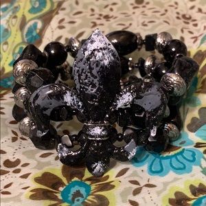 Fleur de lis stretch bracelet w/ black beads